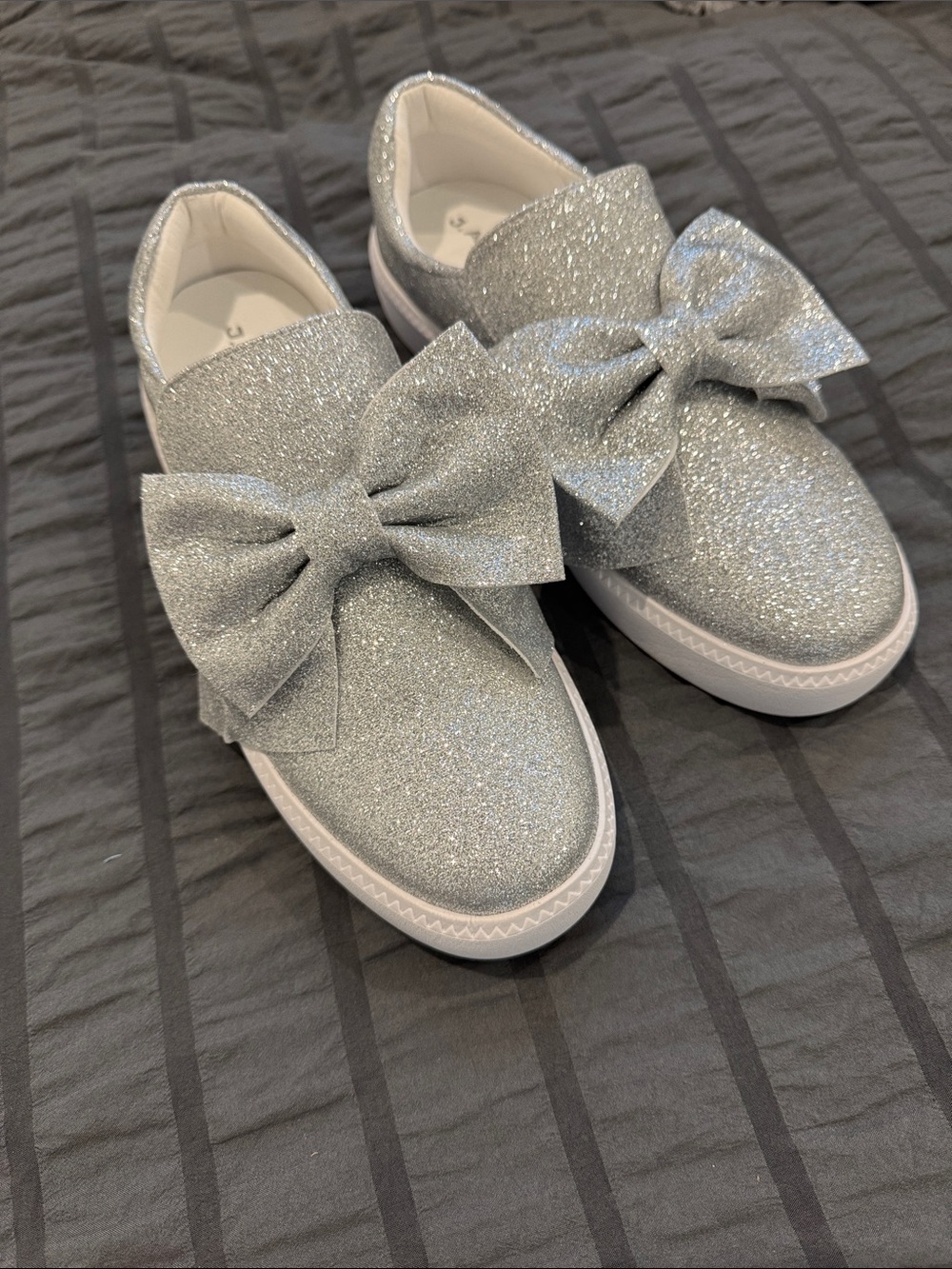 Glitter Slip-On Bow Sneakers in Silver